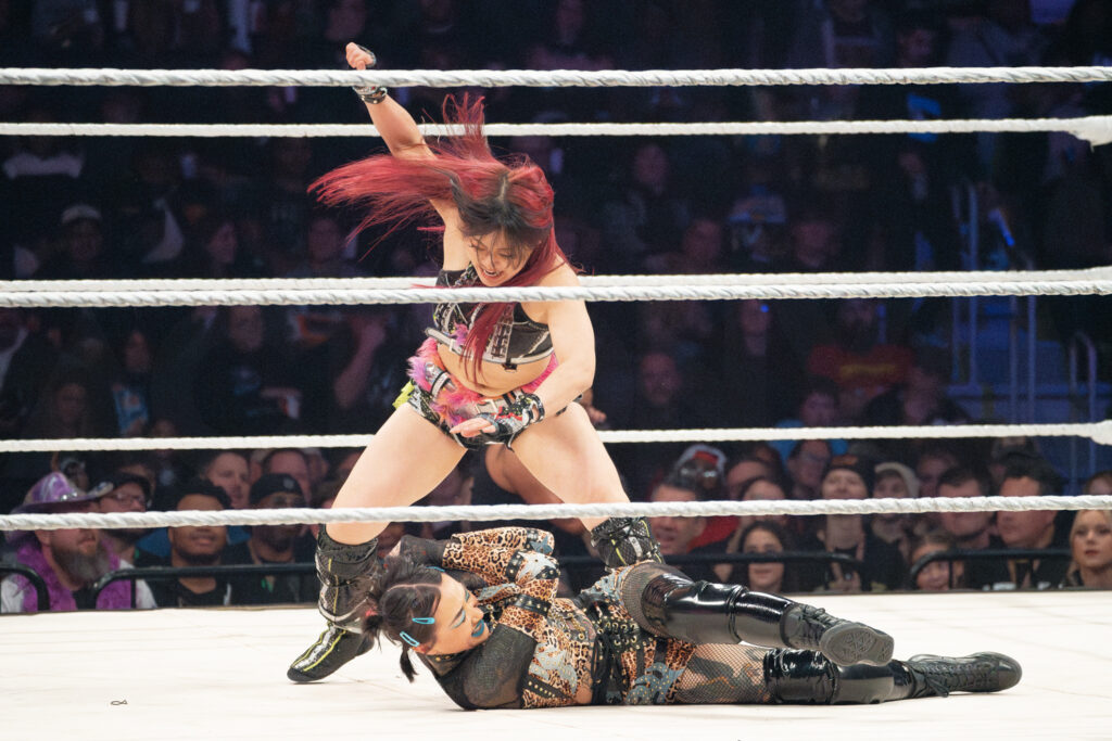45_WWE_SHOTZI AND IYO SKY_WWE HOLIDAY TOUR 2023_AMI NICOLE ACRONYM