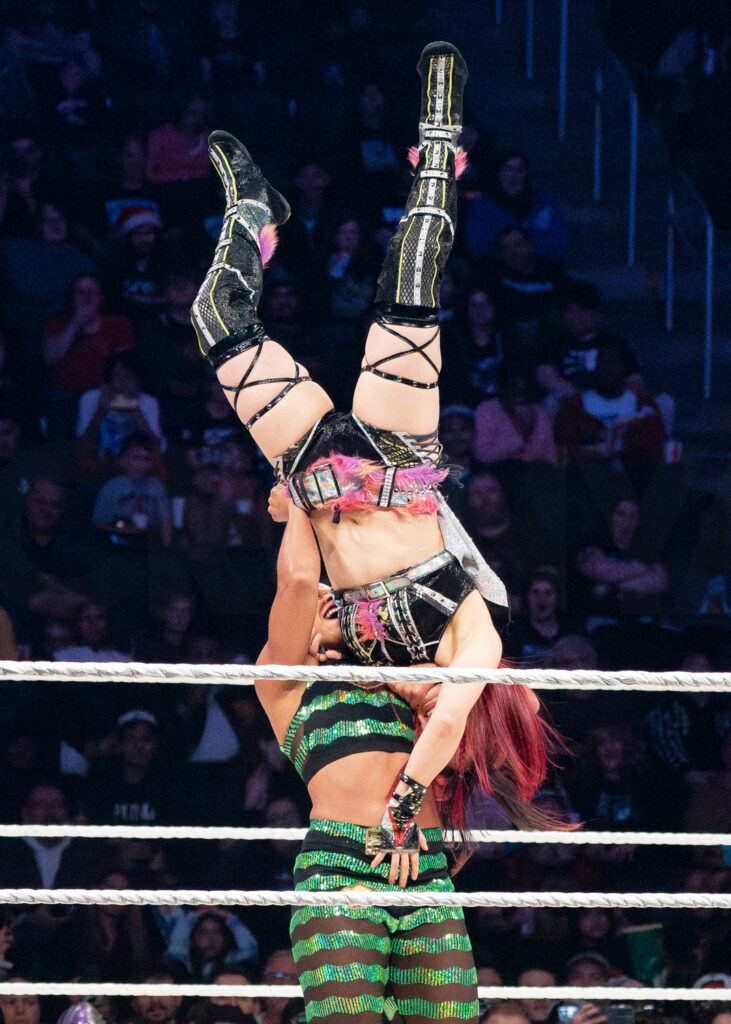 49_WWE_BIANCA BELAIR AND IYO SKY_WWE HOLIDAY TOUR 2023_AMI NICOLE ACRONYM